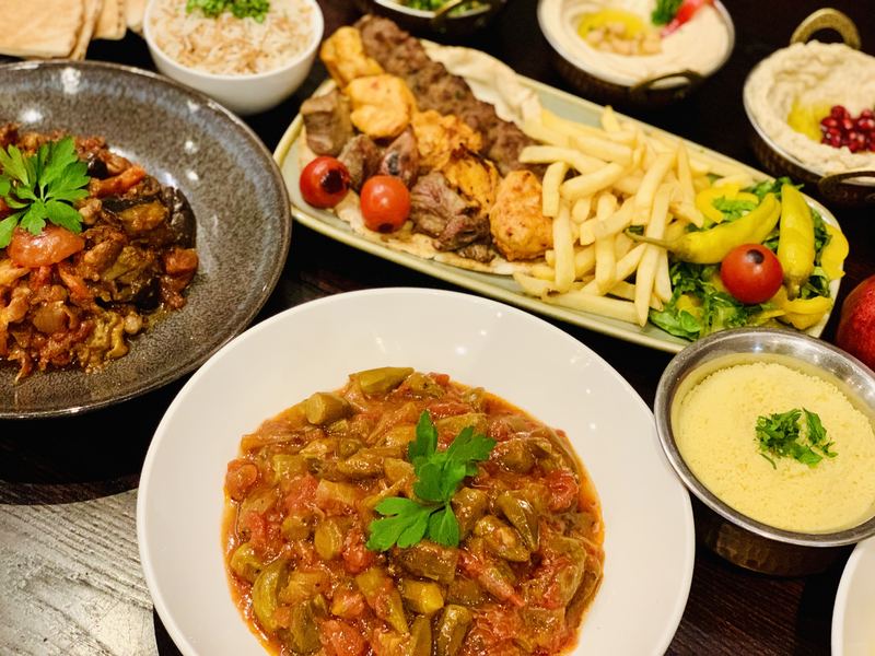 Okra stew with rice, mixed grill and dips